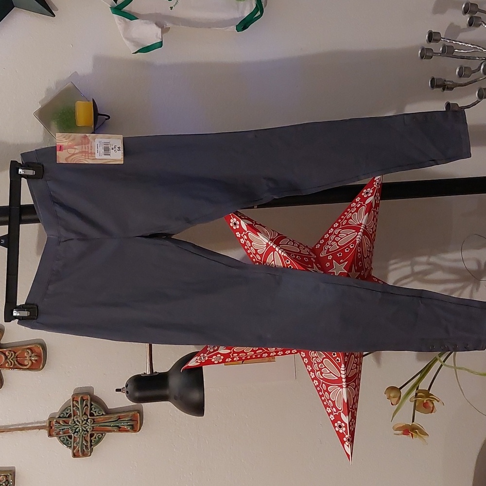 Soft gray leggings with snap buttons on the bottom